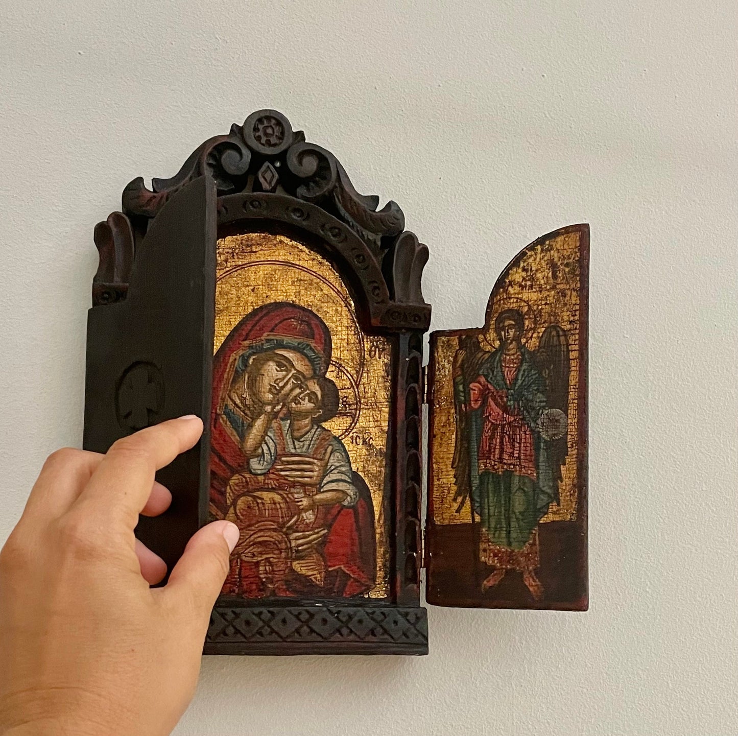 Virgin and Child, two angels on the two windows, Byzantine icon with woodcarved frame