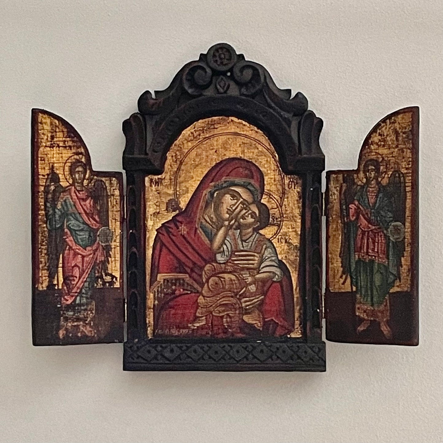 Virgin and Child, two angels on the two windows, Byzantine icon with woodcarved frame