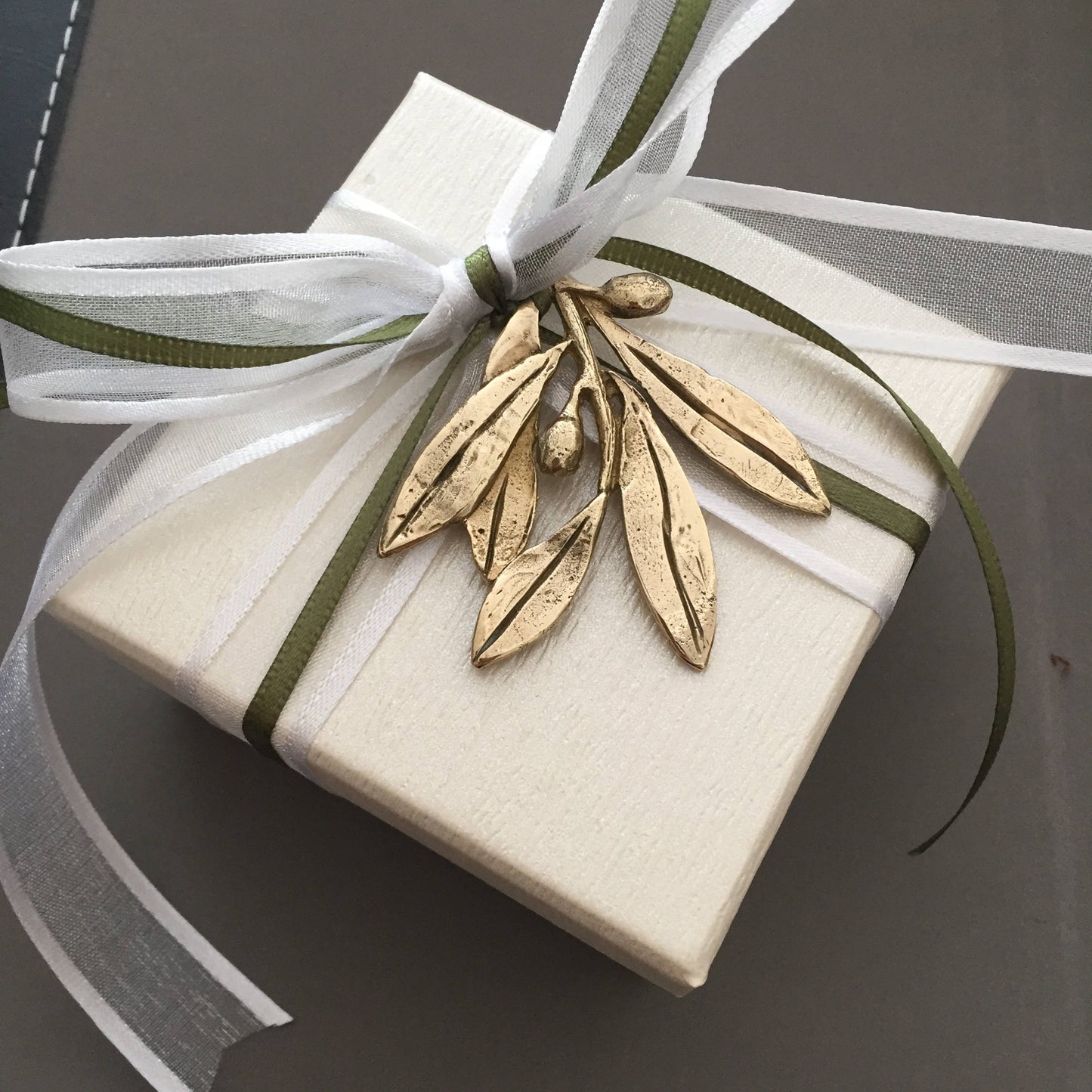 Wedding bomboniere, wedding favor,handmade bronze olive branch tied with satin ribbons on a box with sugared almonds, sold by the dozen